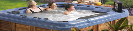 family enjoying hot tub in Scotland